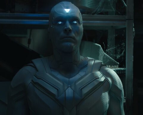 Visione Bianco con gli occhi azzurri luminosi in un ambiente buio in VisionQuest 1x01 – No Strings
